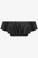Black off-shoulder swim top on a grey background
