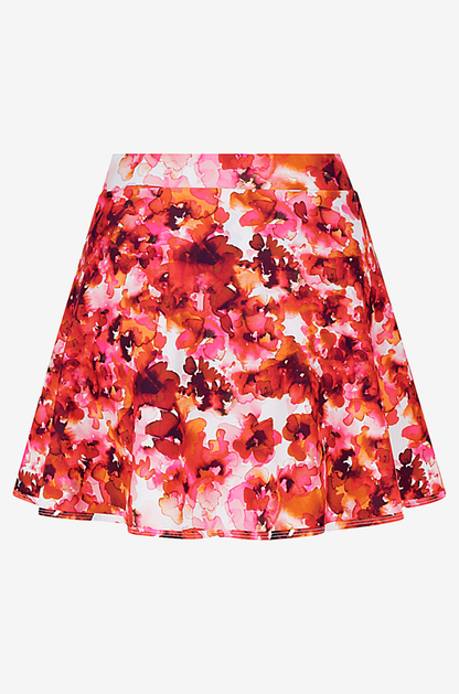 Back view of a red and pink floral patterned high-waisted swim skirt on a grey background