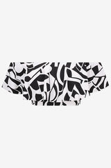 Black and white geometric patterned off-shoulder swim top on a grey background