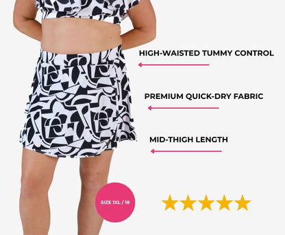 Black and white geometric high-waisted swim skirt on a model size 1XL/18 with text highlighting features and a five-star rating