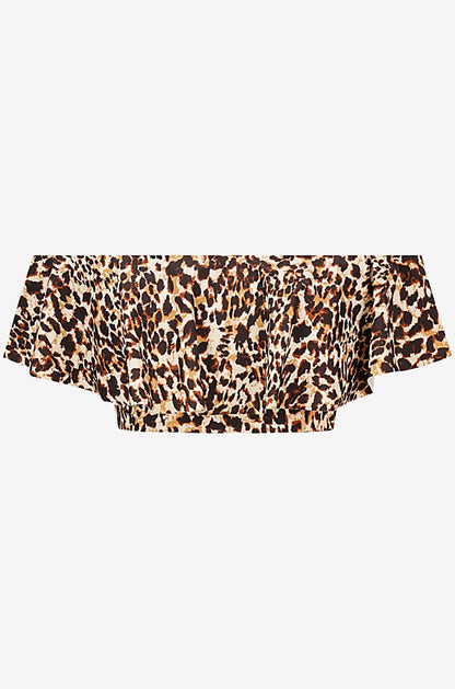 Off-shoulder swim top in leopard print set on a grey background