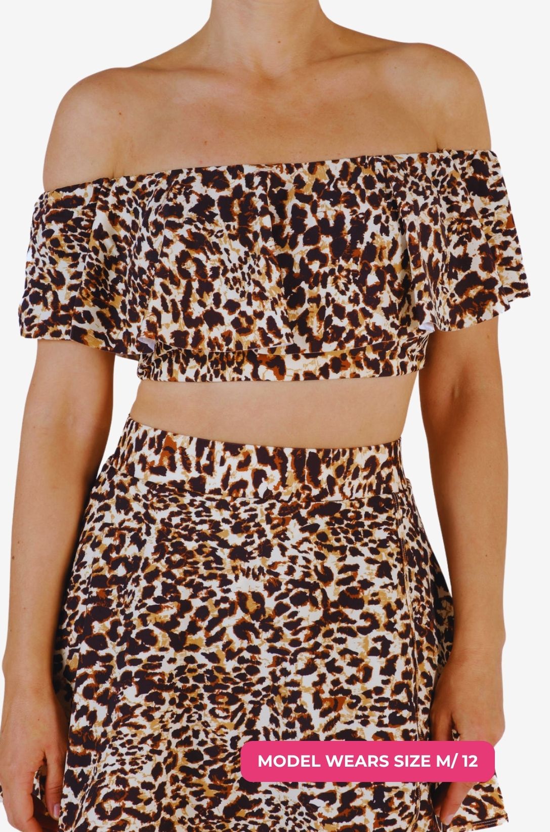 Model size M/12 wearing an off-shoulder swim top in leopard print
