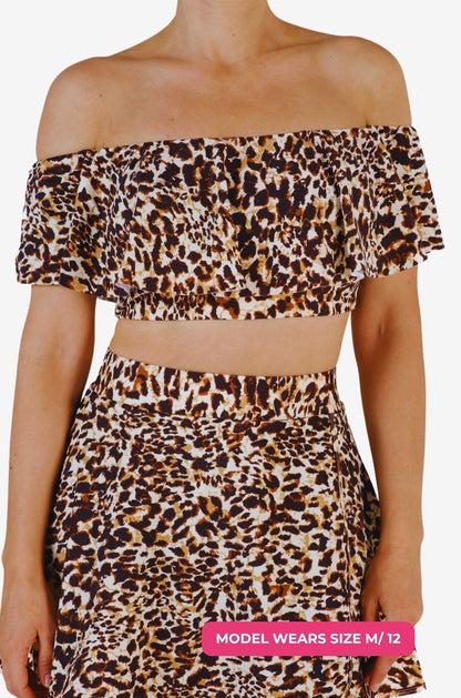 Model size M/12 wearing an off-shoulder swim top in leopard print